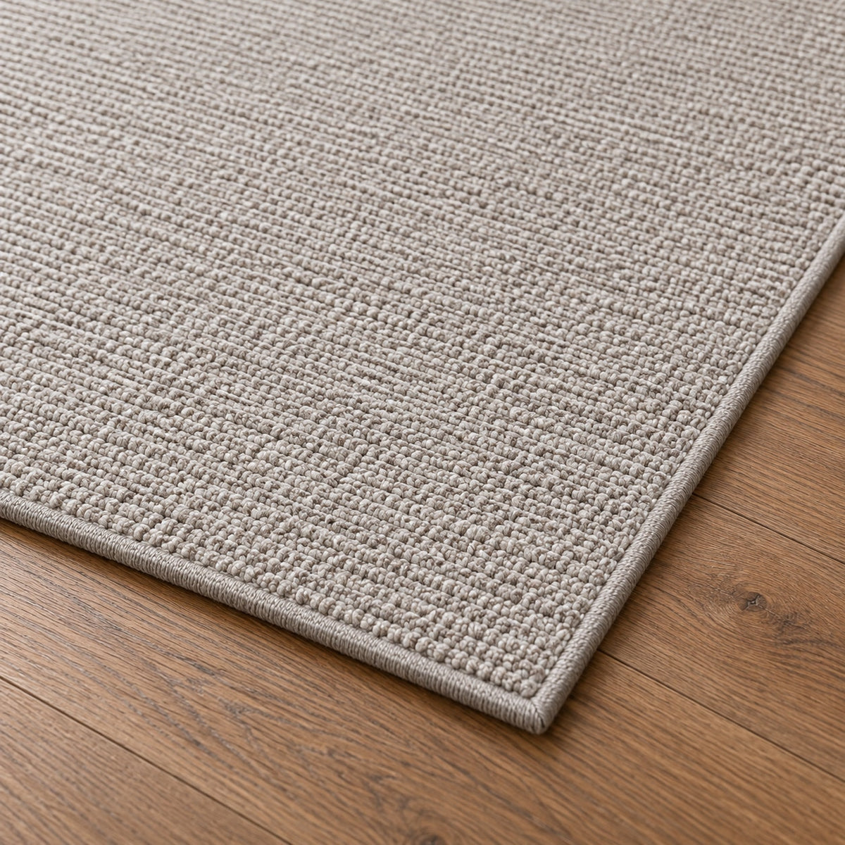 Tapis Alpage gris — détail de la bordure et de l'épaisseur