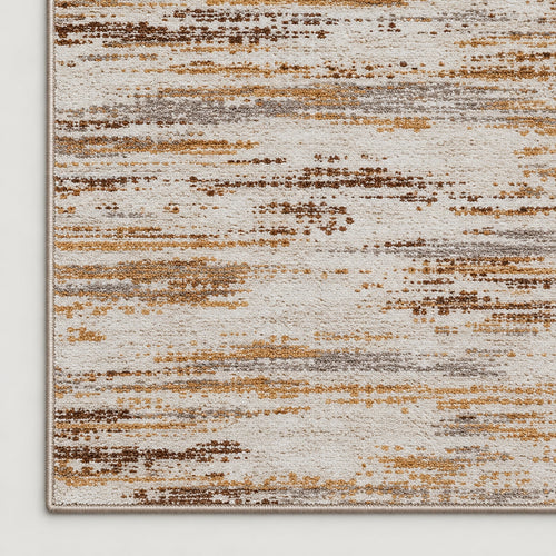 Tapis Ambre ivoire et ocre — coin et texture sur fond clair