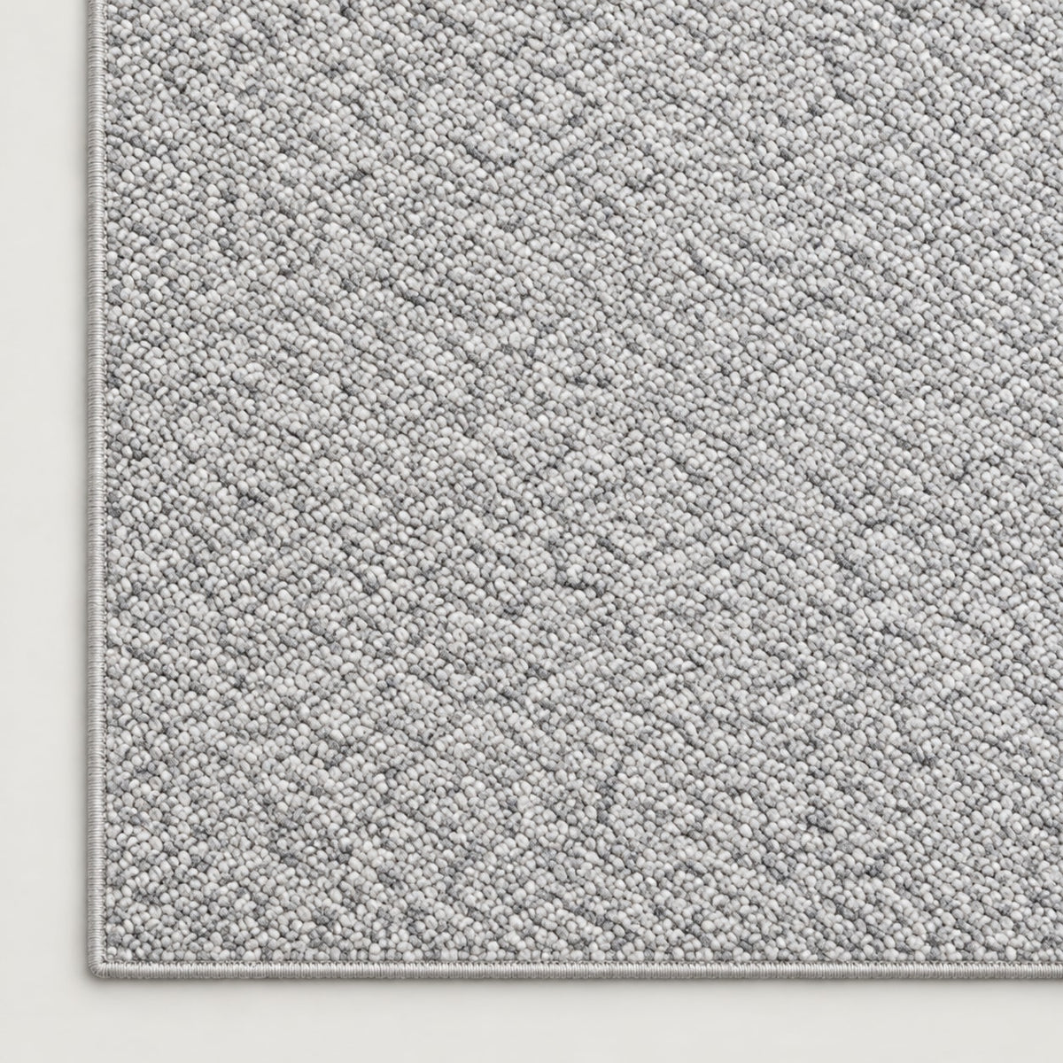 Tapis Ardoise gris perle — coin et texture sur fond clair