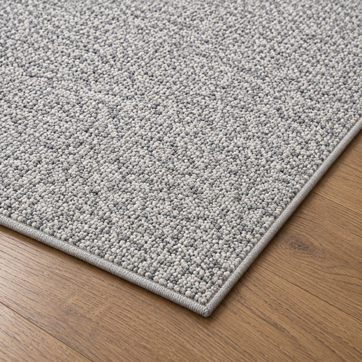 Tapis Ardoise gris perle — détail de la bordure et de l'épaisseur