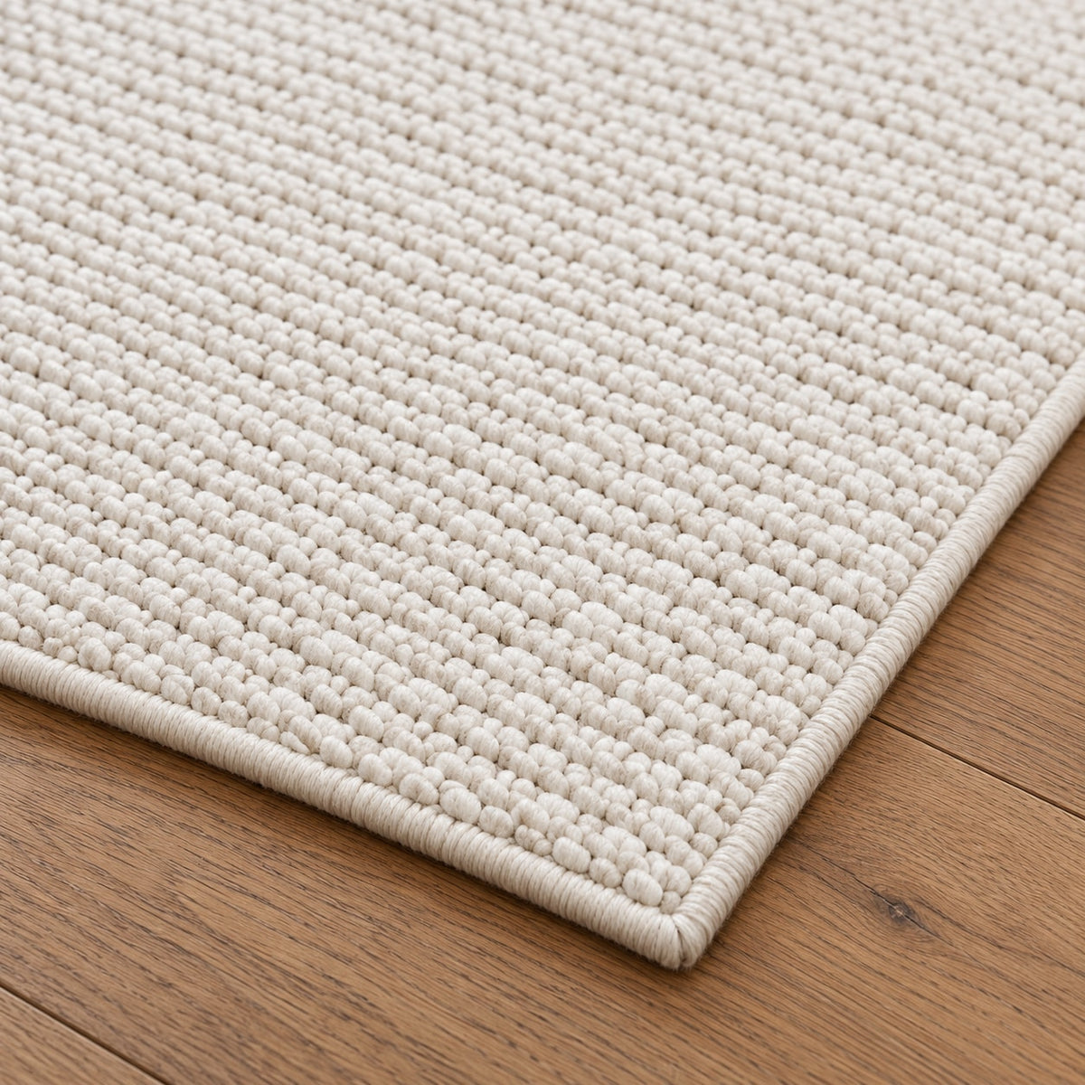 Tapis Craie blanc craie — détail de la bordure et de l'épaisseur