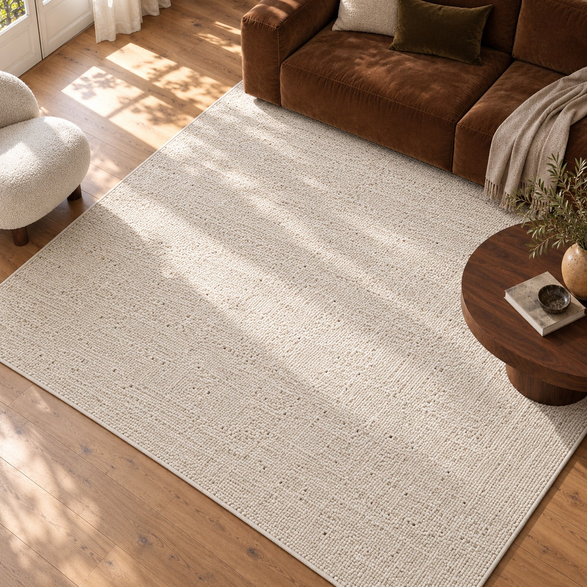 Tapis Grès écru chiné — vue de haut dans un salon