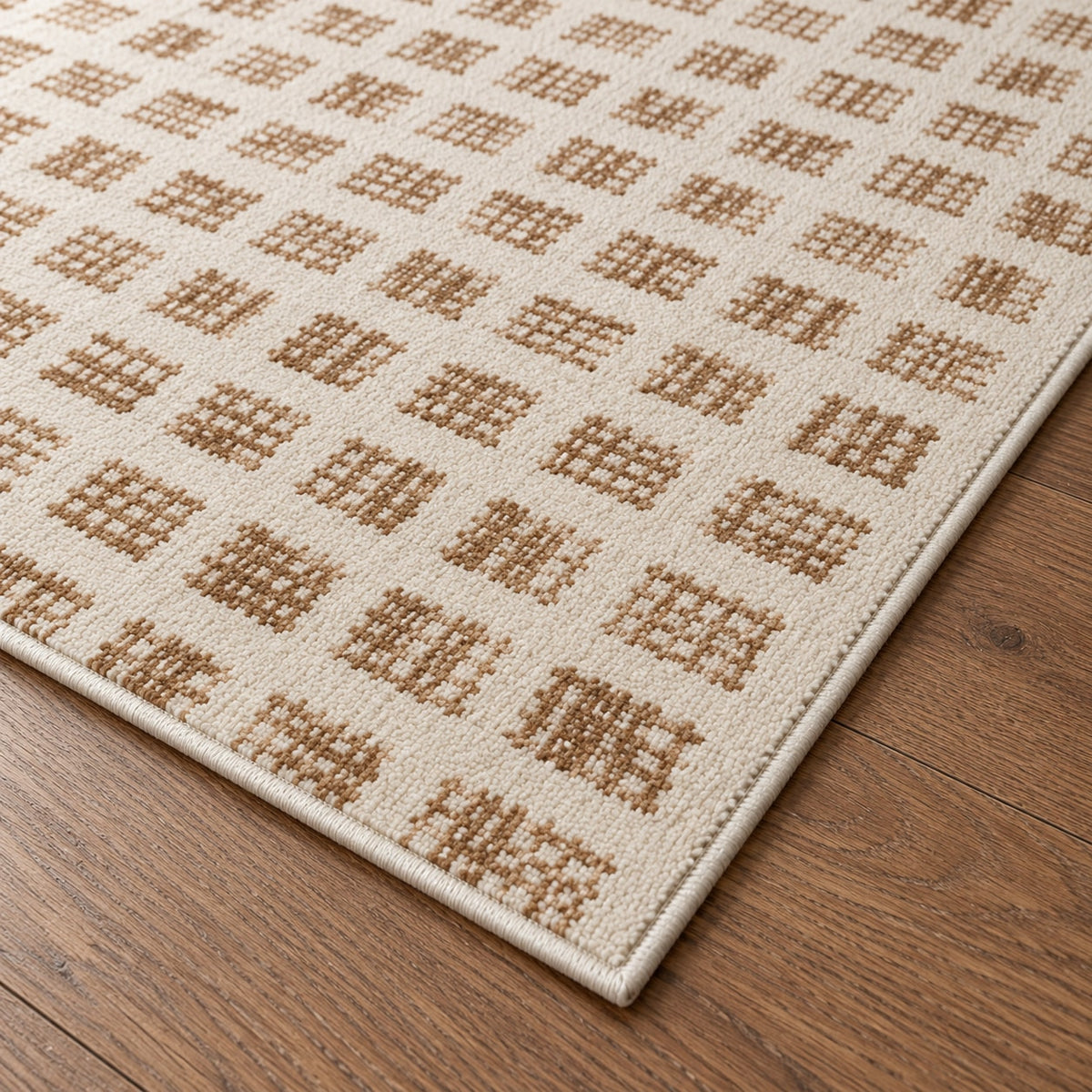 Tapis Mistral ivoire et camel — détail de la bordure et de l'épaisseur