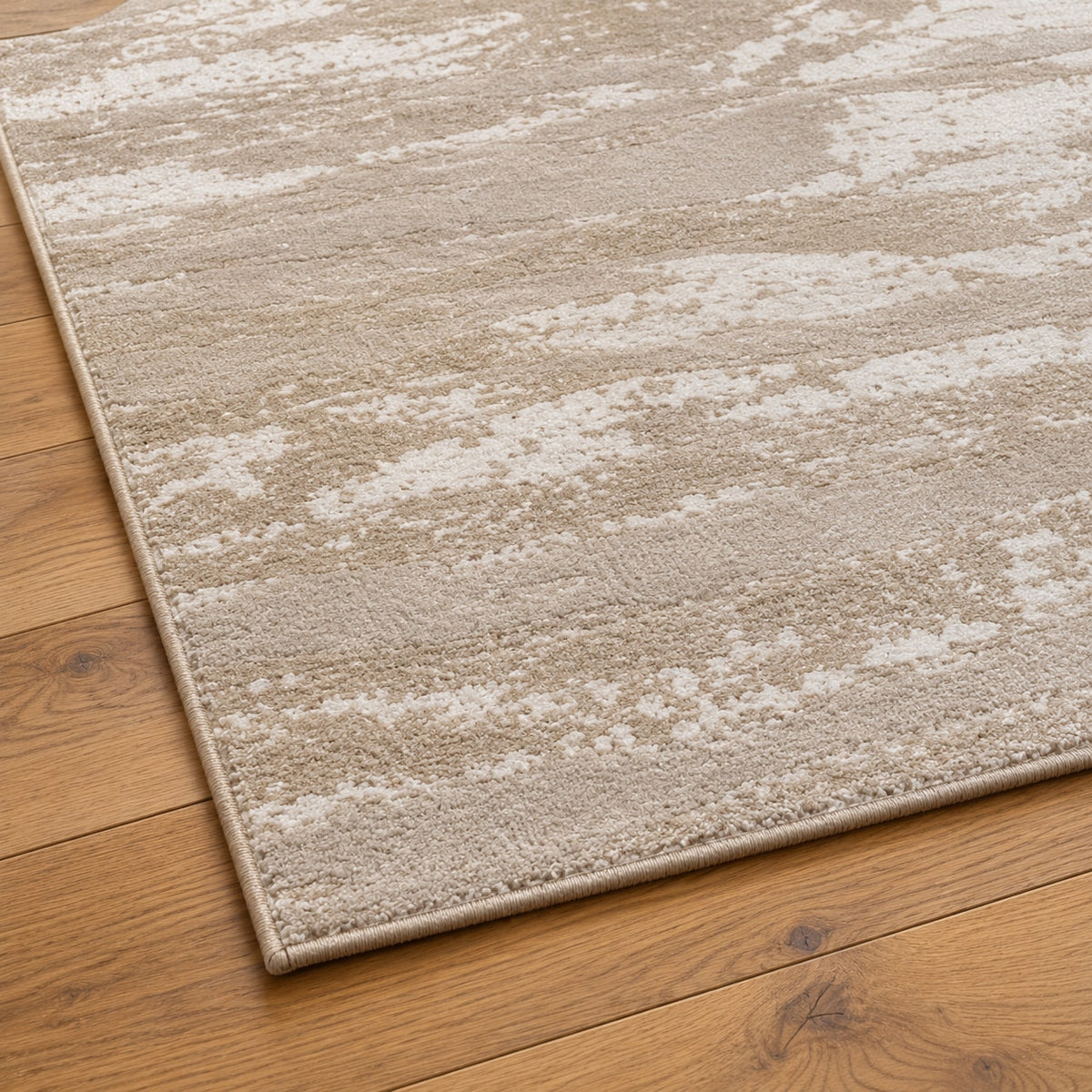 Tapis Nacre sable doré — détail de la bordure et de l'épaisseur