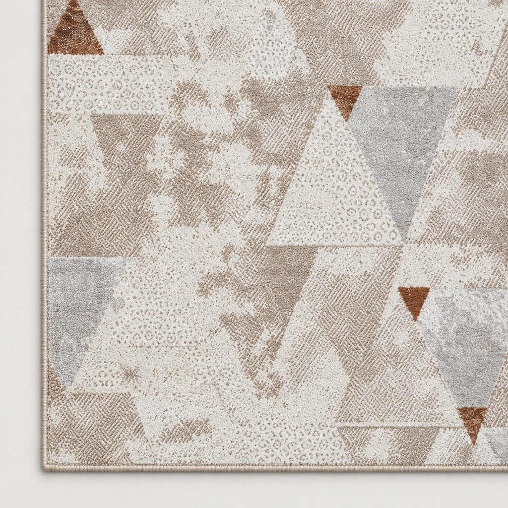 Tapis Prisme taupe — coin et texture sur fond clair