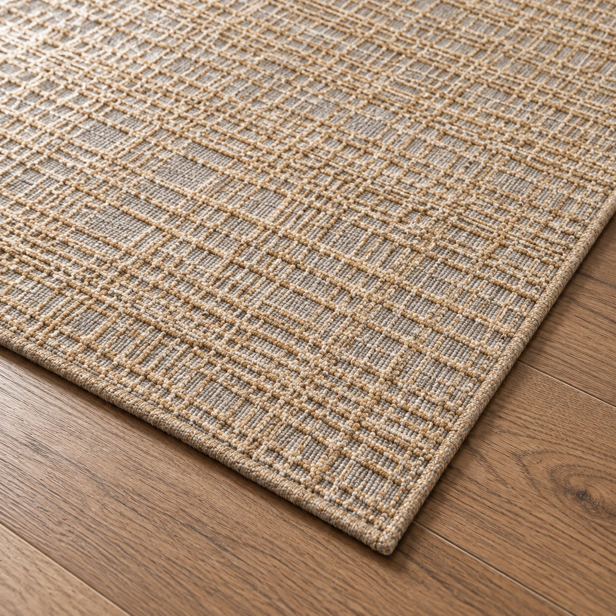 Tapis Sillon camel — détail de la bordure et de l'épaisseur
